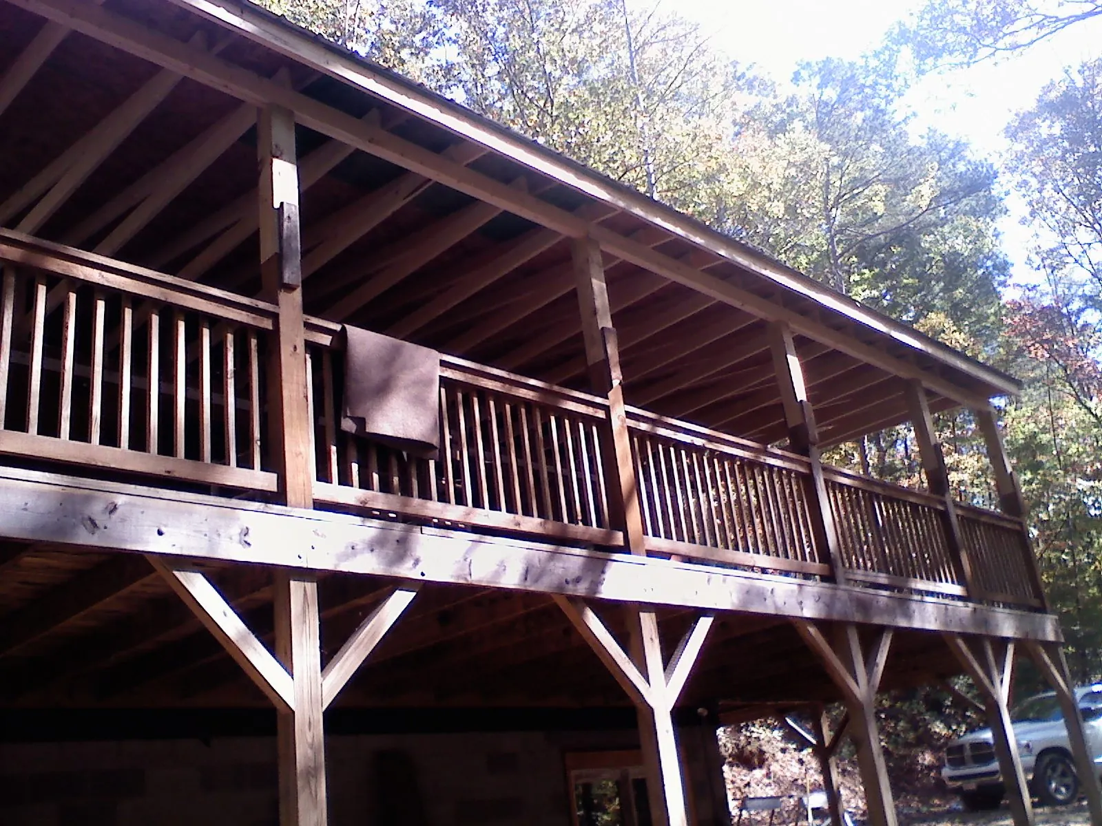 Timber framing under a new elevated porch and deck — Roof Leak Repair in Little Cedar by Roofing Brothers
